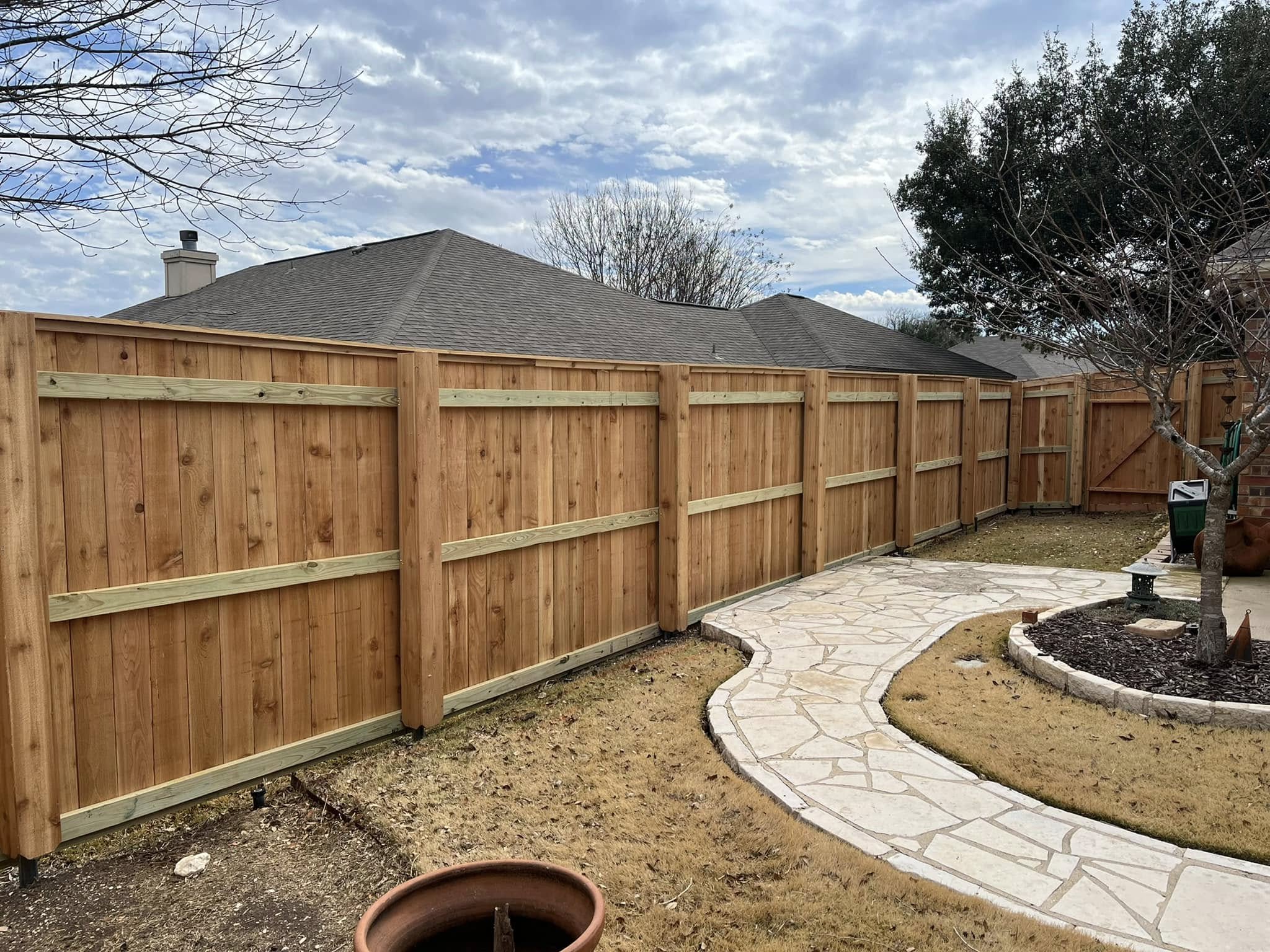 Board-on-Board Fence with Stone Path — Harker Heights, TX